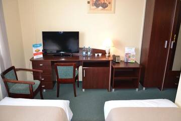 Фото номера Двухместный номер с 2 отдельными кроватями Отель Hotel Solpark г. Kleszczów 9